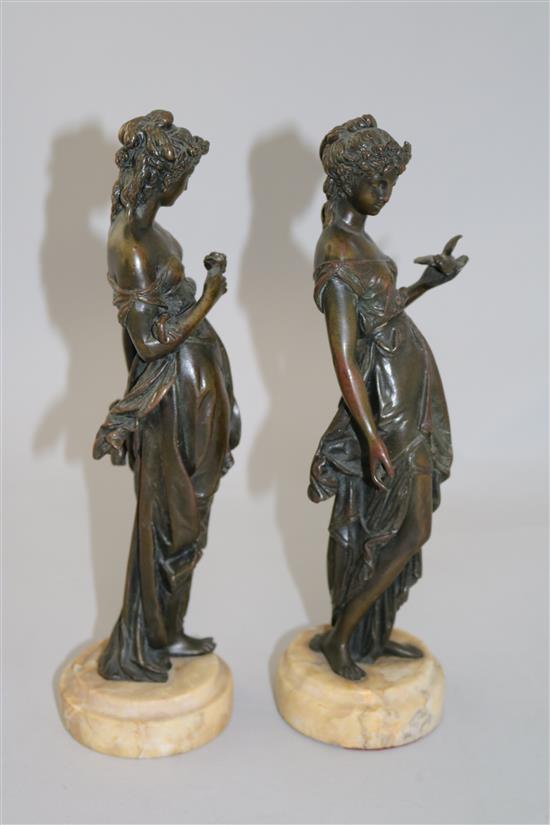 A pair of late 19th century French bronze figures of classical maidens, 11in.